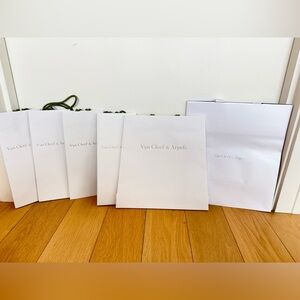 Lot of 6 Van Cleef & Arpels white designer shopping bags